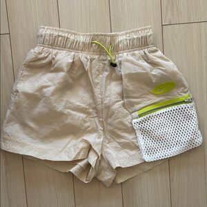 Nike Light Tan Shorts with White Mesh Pocket